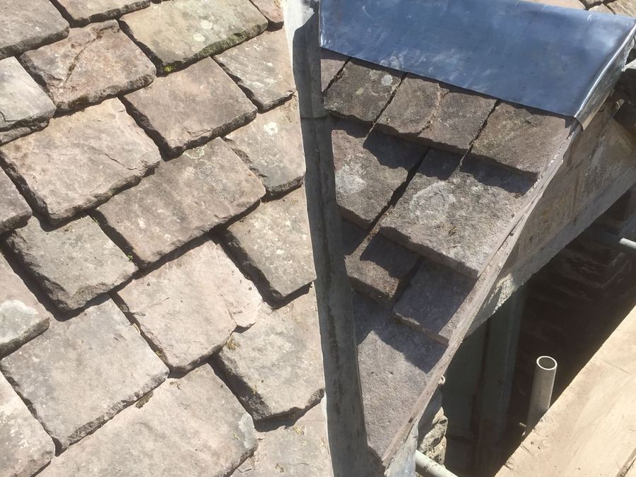 Lead flashing and slate work around a chimney