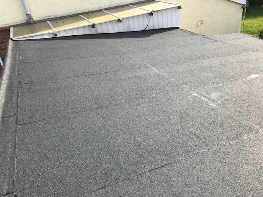 A completed built-up felt flat roof